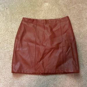 Burnt orange faux leather skirt